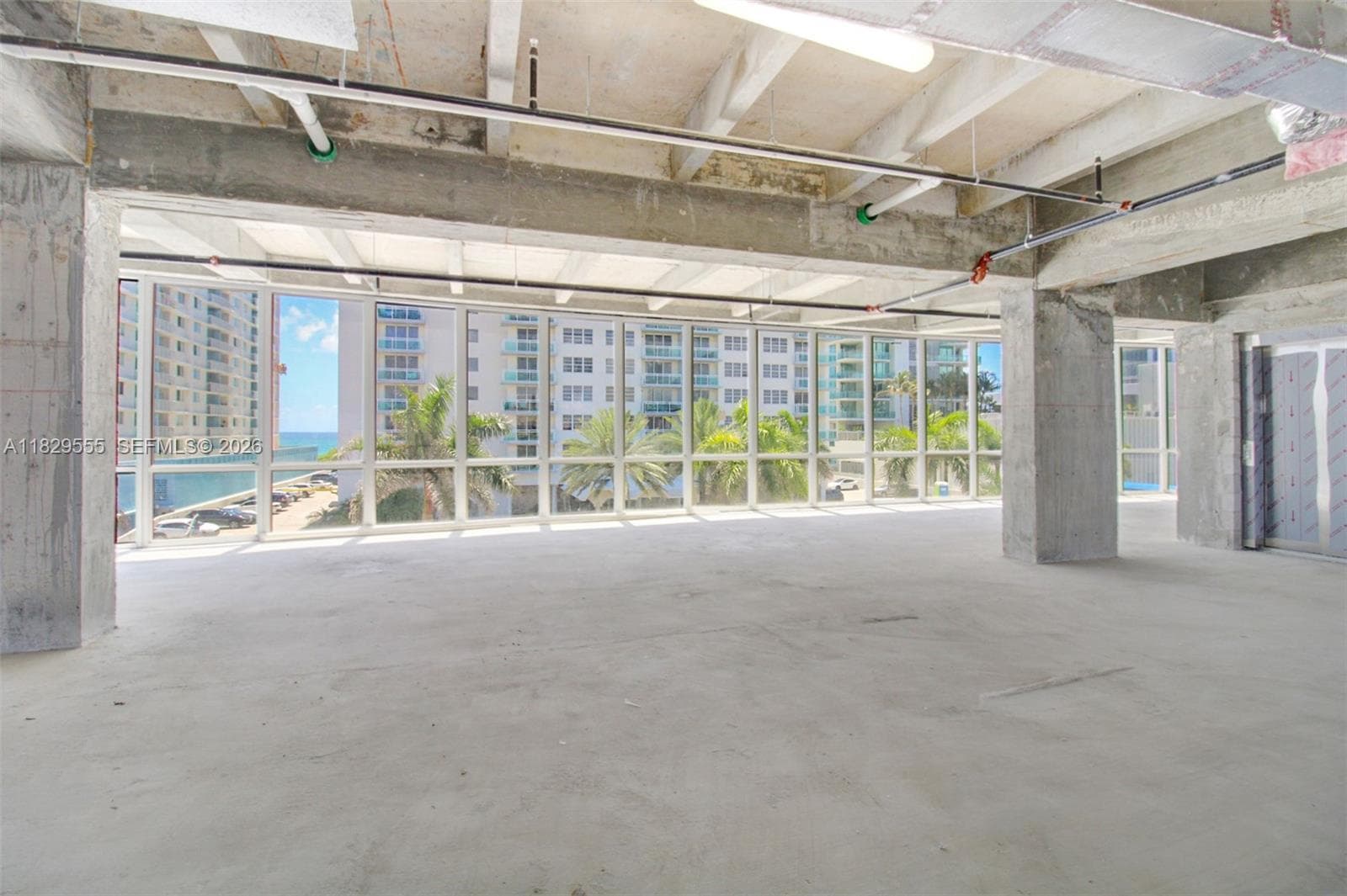 Floor to ceiling wall to wall impact windows.