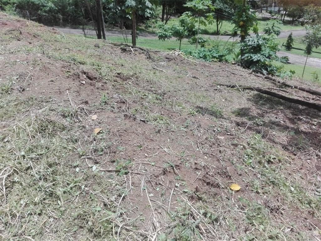THIS CORNER SIDE, FACES THE PAVED ROAD