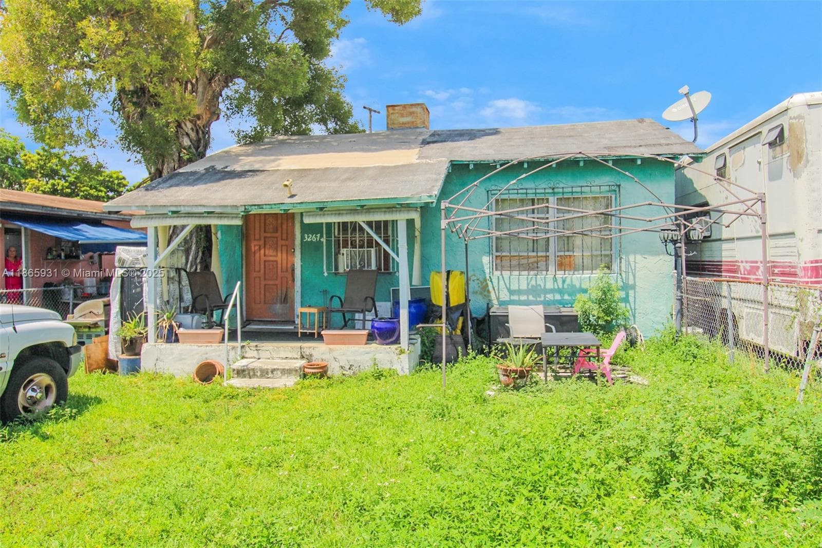 3rd property on NW 35th Street of assemblage. Tear down home on Duplex Zoned/RU-3 Lot in Miami Dade County.