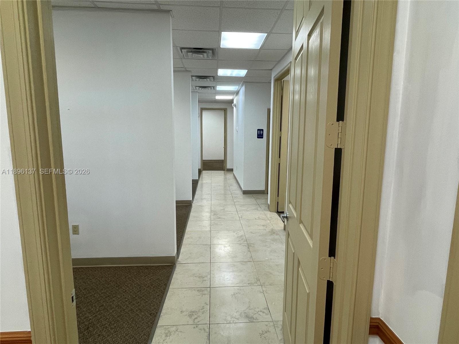 Hallway to offices. View from reception area.